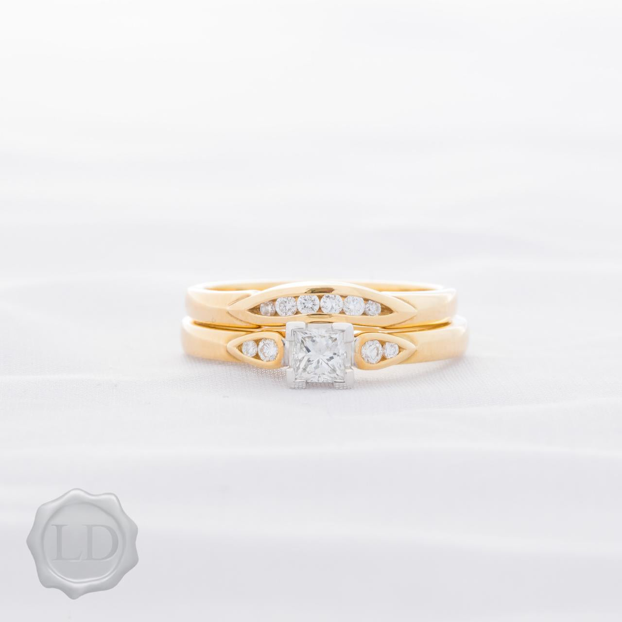 Yellow gold princess cut solitaire ring