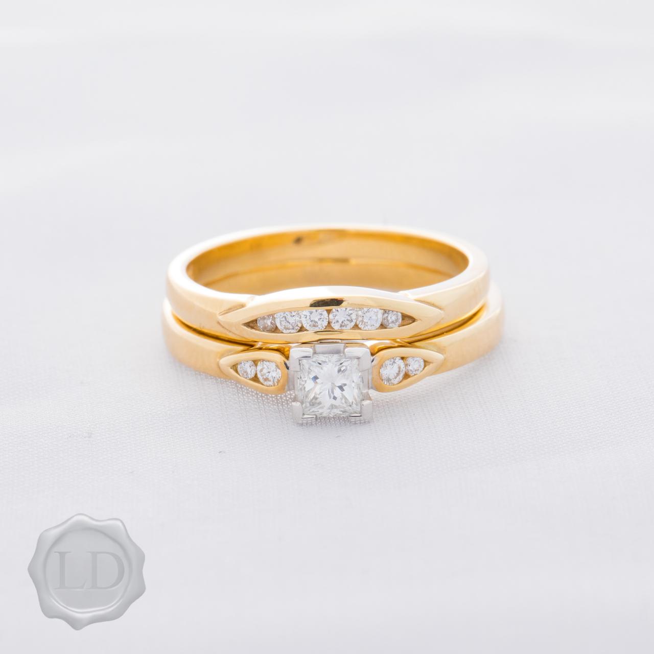 Yellow gold princess cut solitaire ring