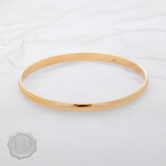 Classic yellow gold, solid golf bangle Classic yellow gold, solid golf bangle