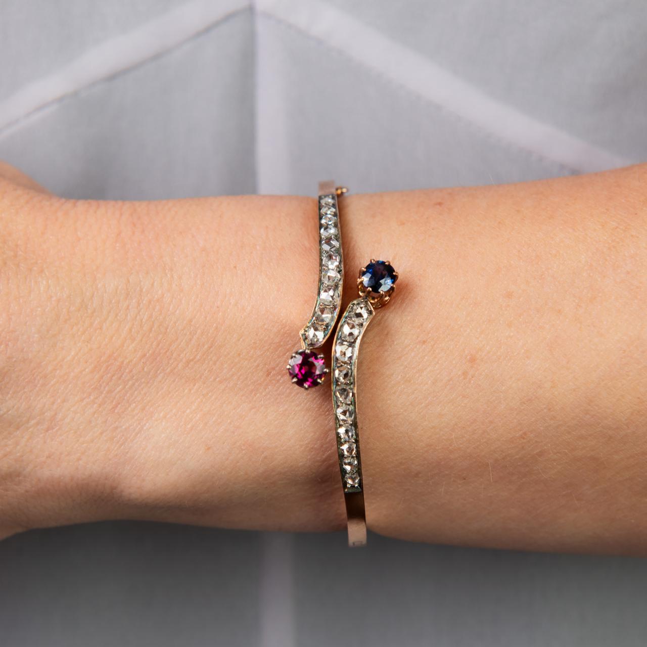 French diamond sapphire and red garnet bangle