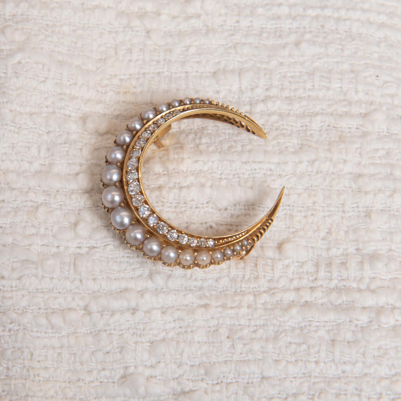 Glorious high carat pearl & diamond crescent brooch