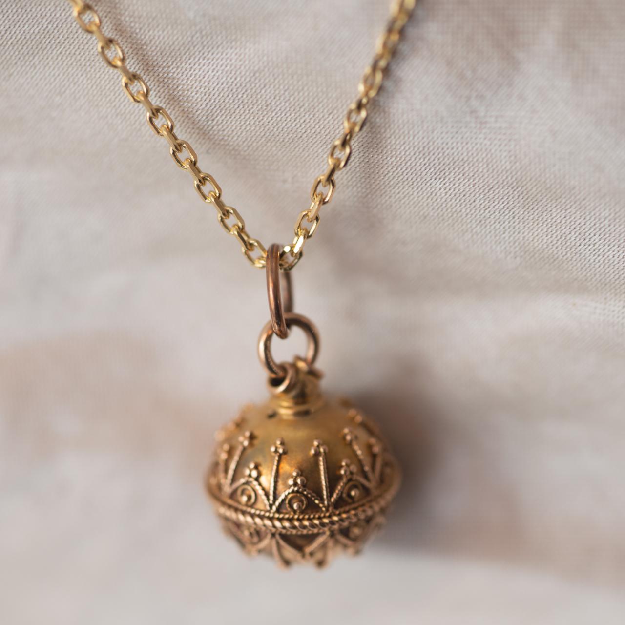 Antique orb charm