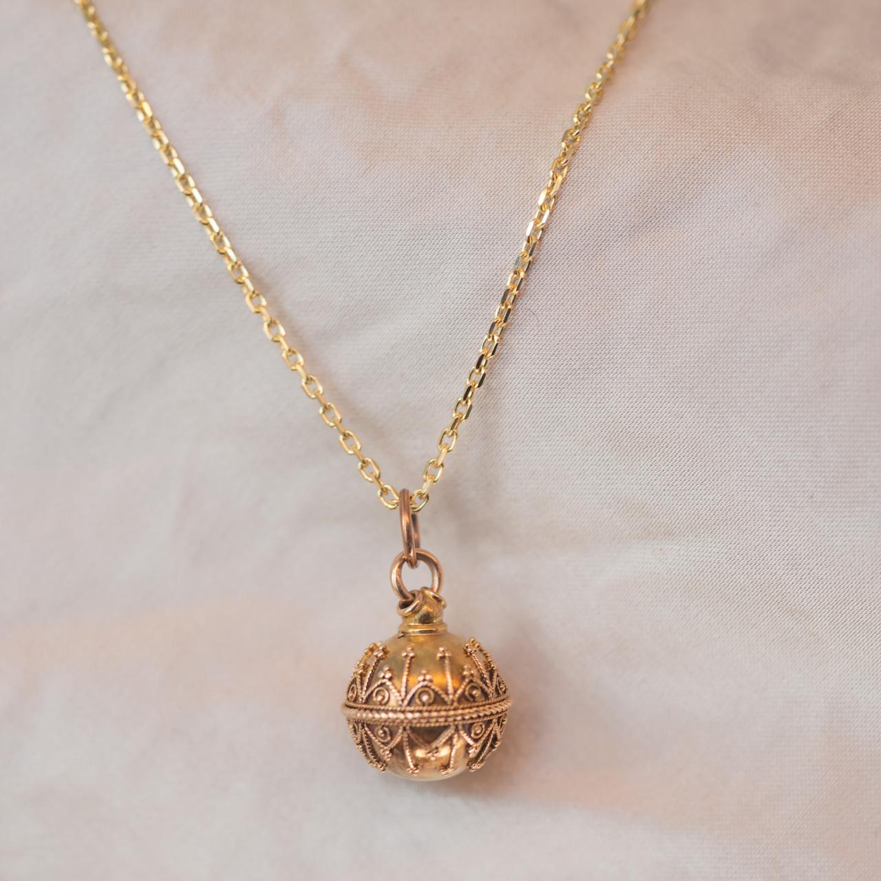 Antique orb charm