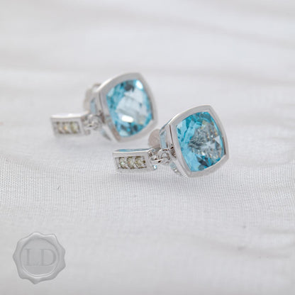 Pale Blue Topaz suspended diamond drop earrings
