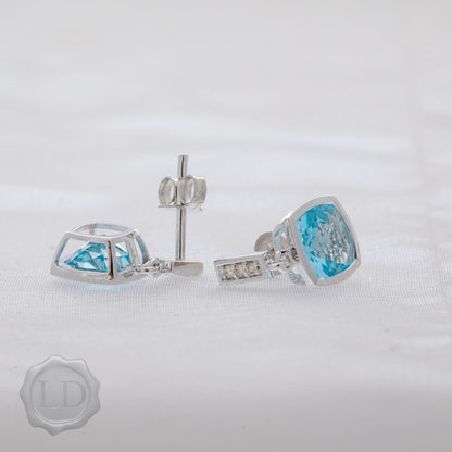 Pale Blue Topaz suspended diamond drop earrings