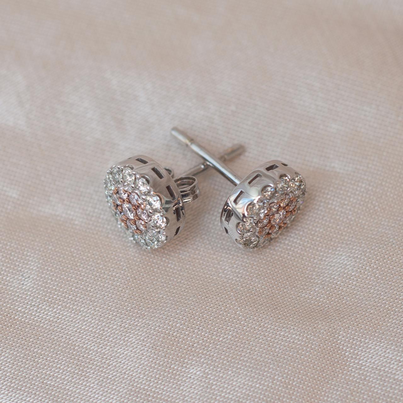 Large Australian Pink diamond and white diamond cluster stud earrings.