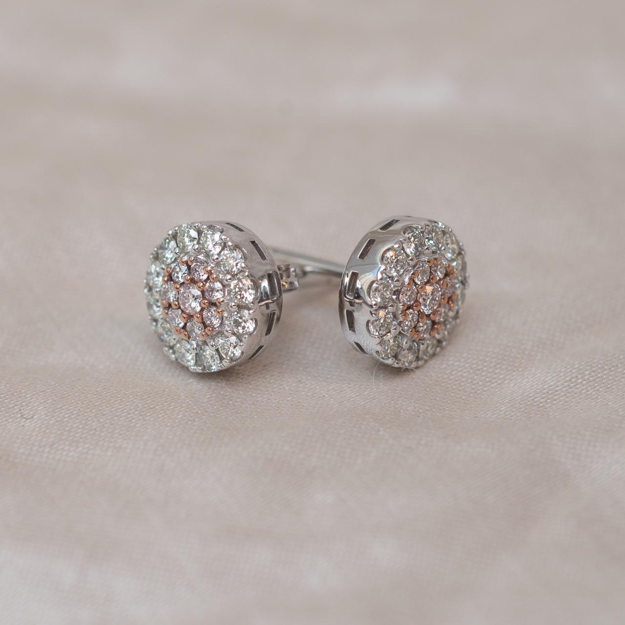 Large Australian Pink diamond and white diamond cluster stud earrings.