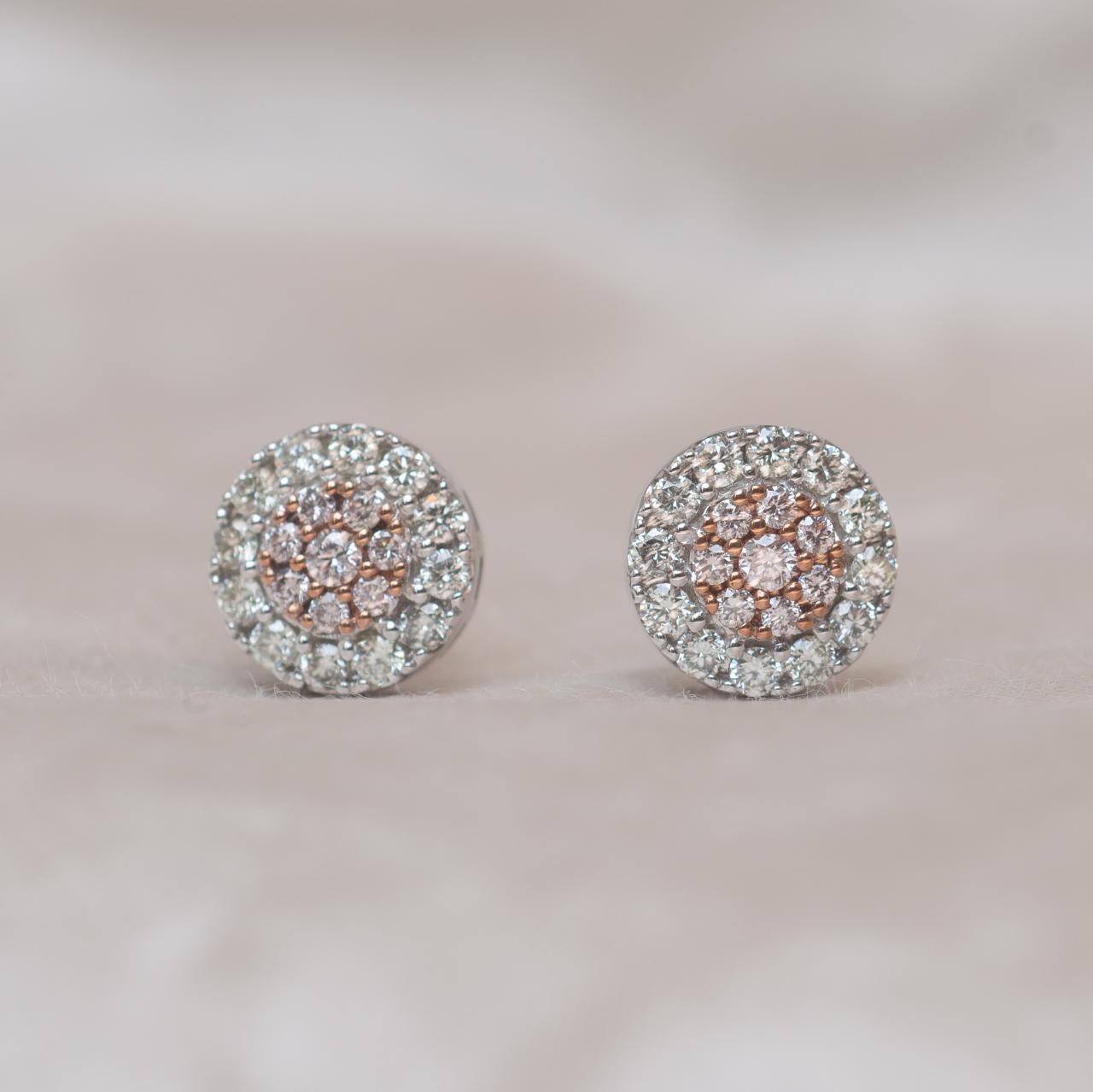 Large Australian Pink diamond and white diamond cluster stud earrings.