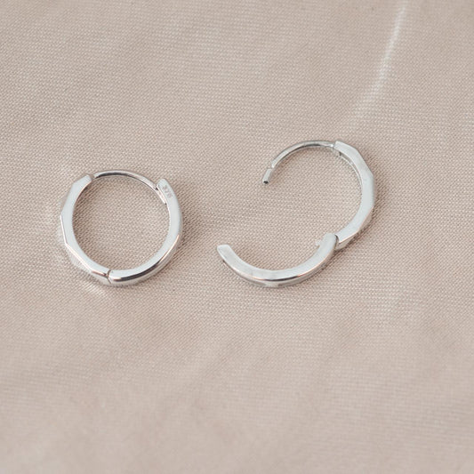 2mm front facet huggie earrings, white gold 2mm front facet huggie earrings, white gold