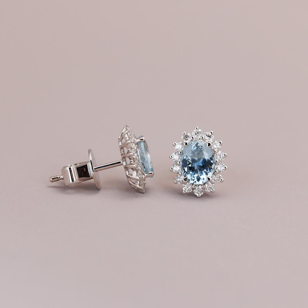 Aquamarine and diamond cluster stud earrings white gold