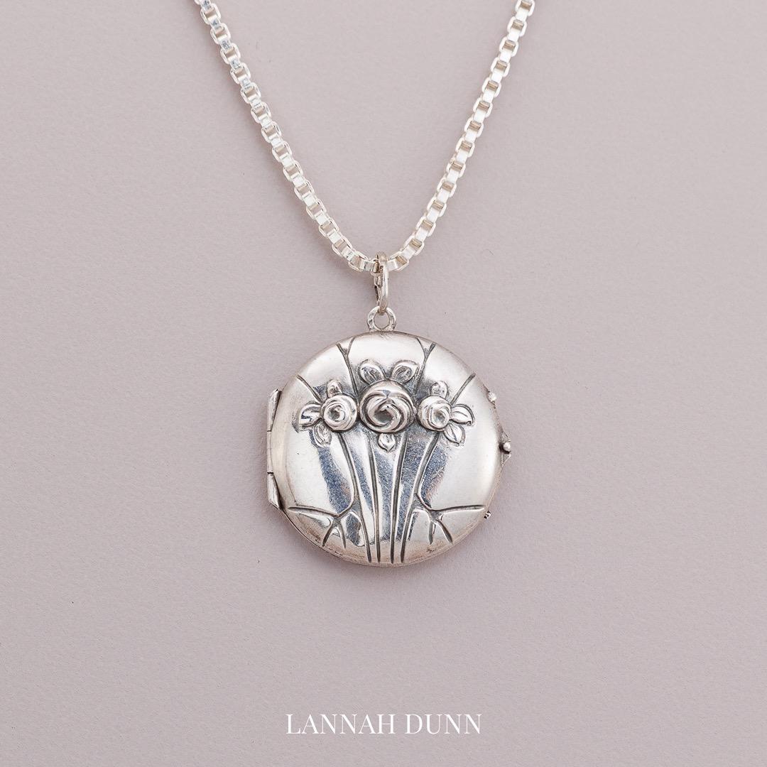 Antique silver flower locket