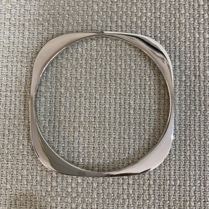 Solid silver edgy bangle