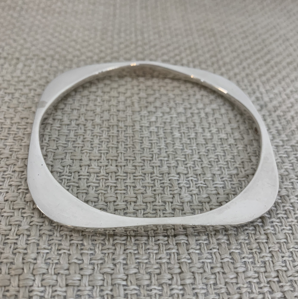 Solid silver edgy bangle