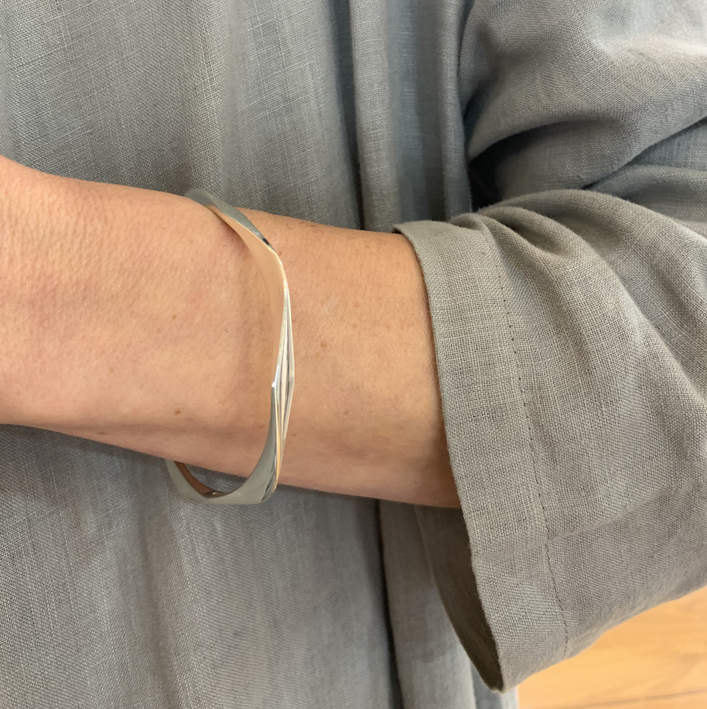 Solid pentagonal sterling silver bangle