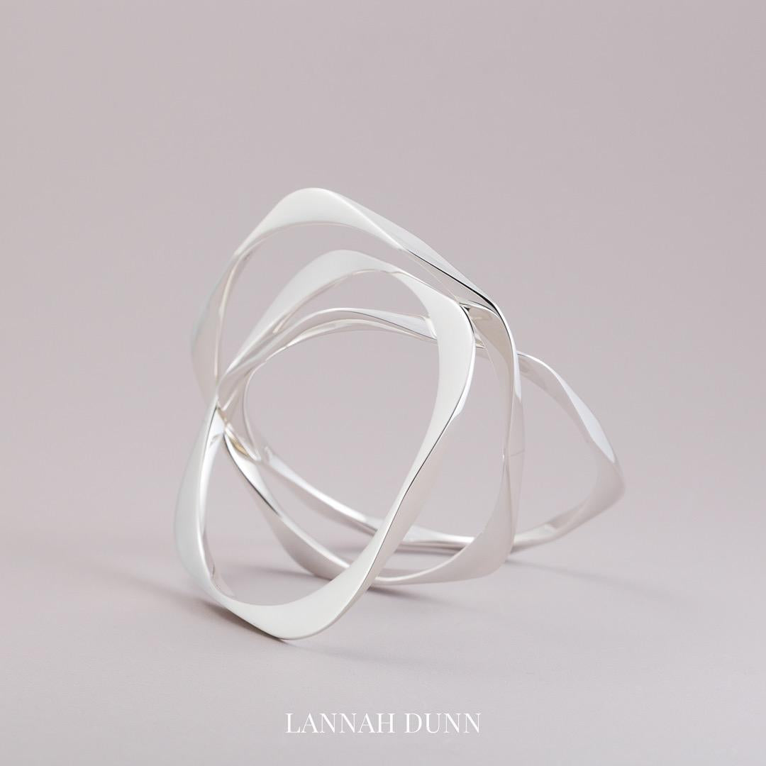 Solid pentagonal sterling silver bangle