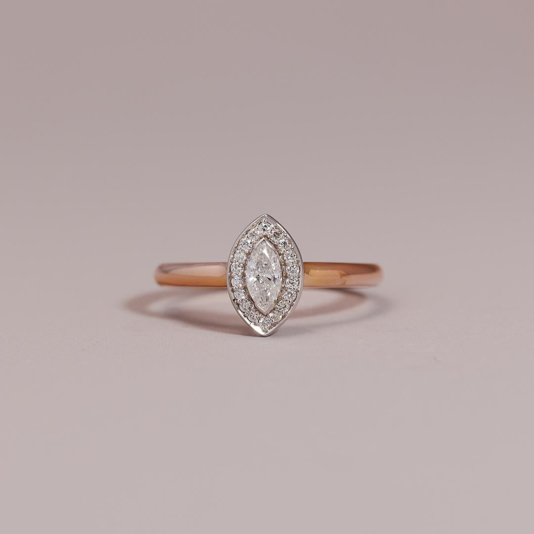 Marquise cut engagment ring with rose & white gold