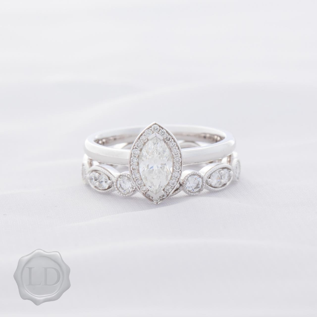 Marquise cut halo engagement ring