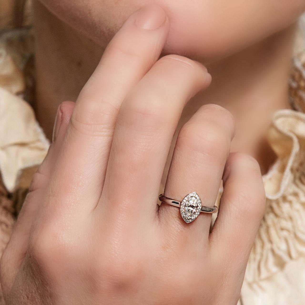 Marquise cut halo engagement ring