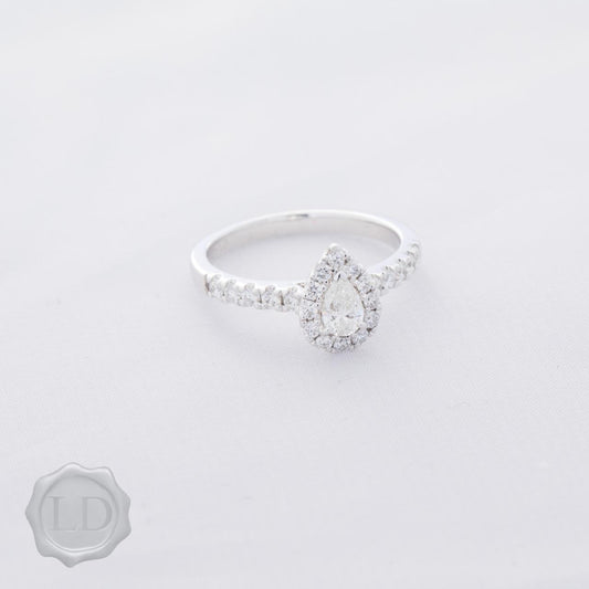 Pear-cut halo with diamond band Pear-cut halo with diamond band