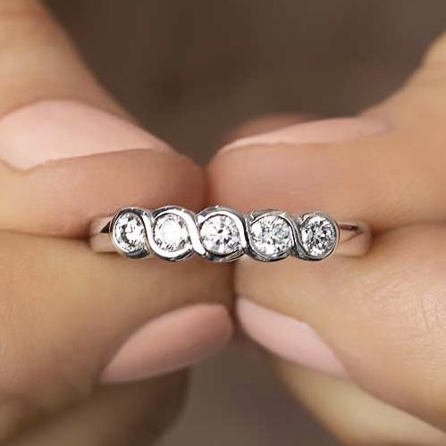 Diamond five stone eternity ring