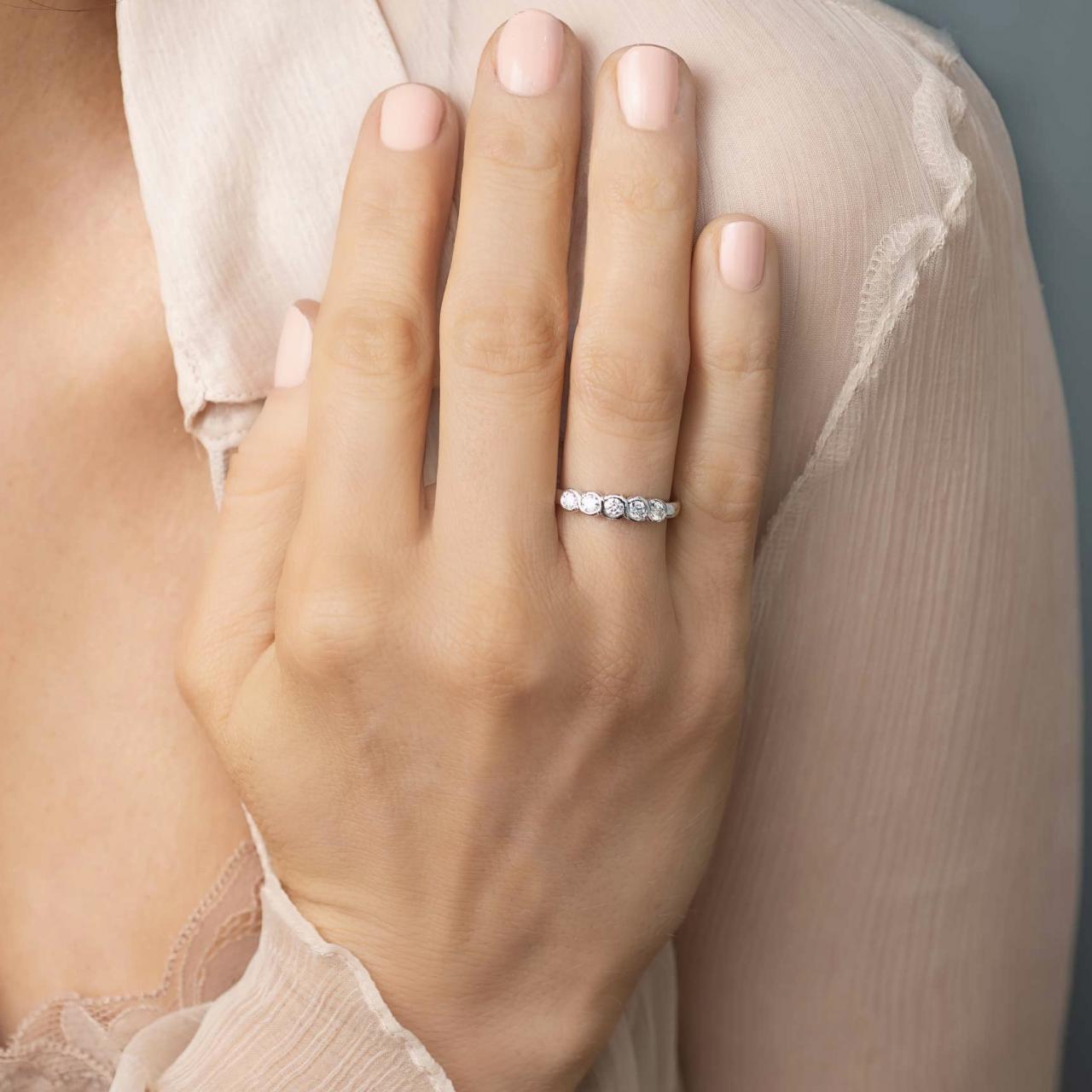 Diamond five stone eternity ring