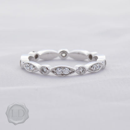 The LD diamond marquise & round continuum band, full circle of diamonds in white gold