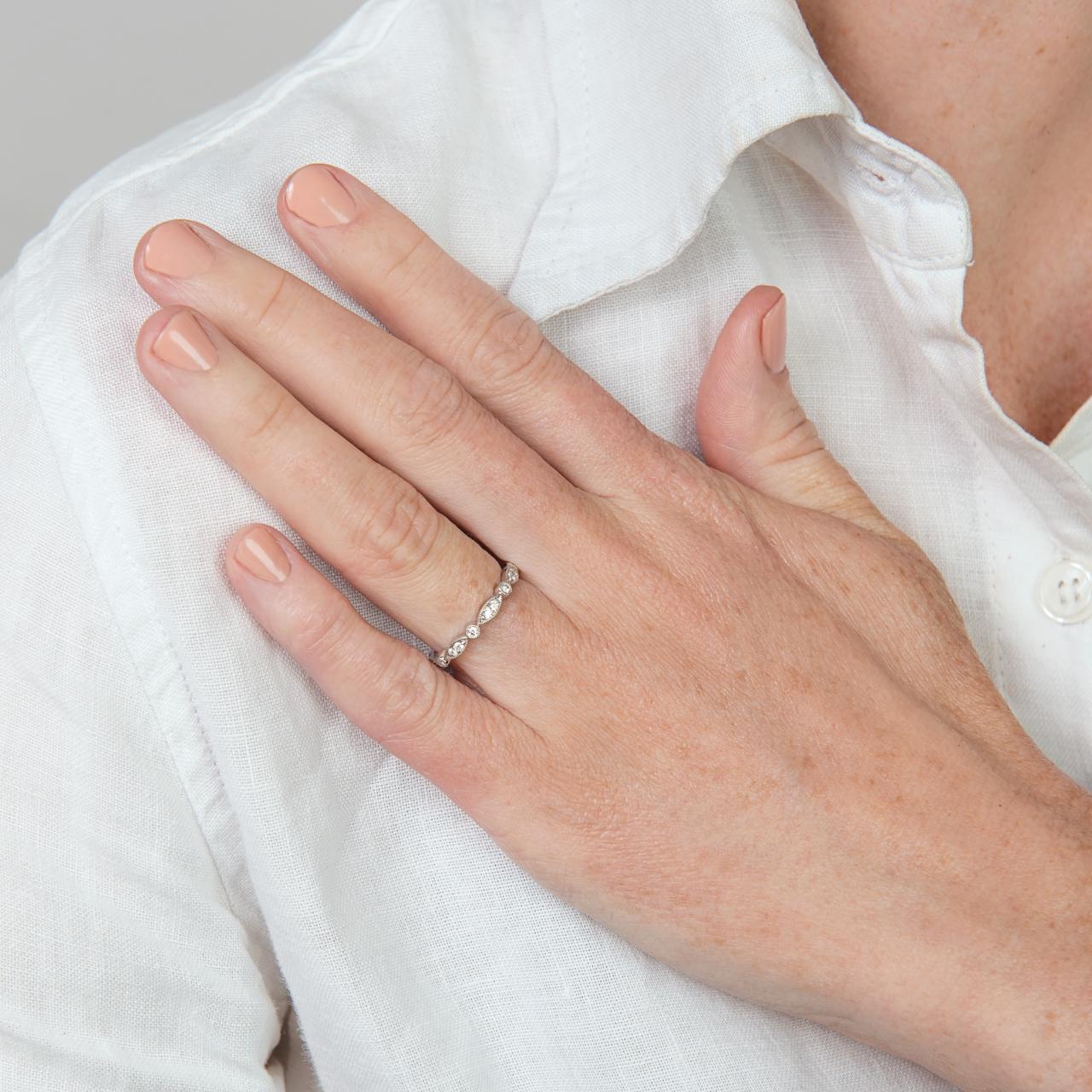 The LD diamond marquise & round continuum band, full circle of diamonds inwhite gold