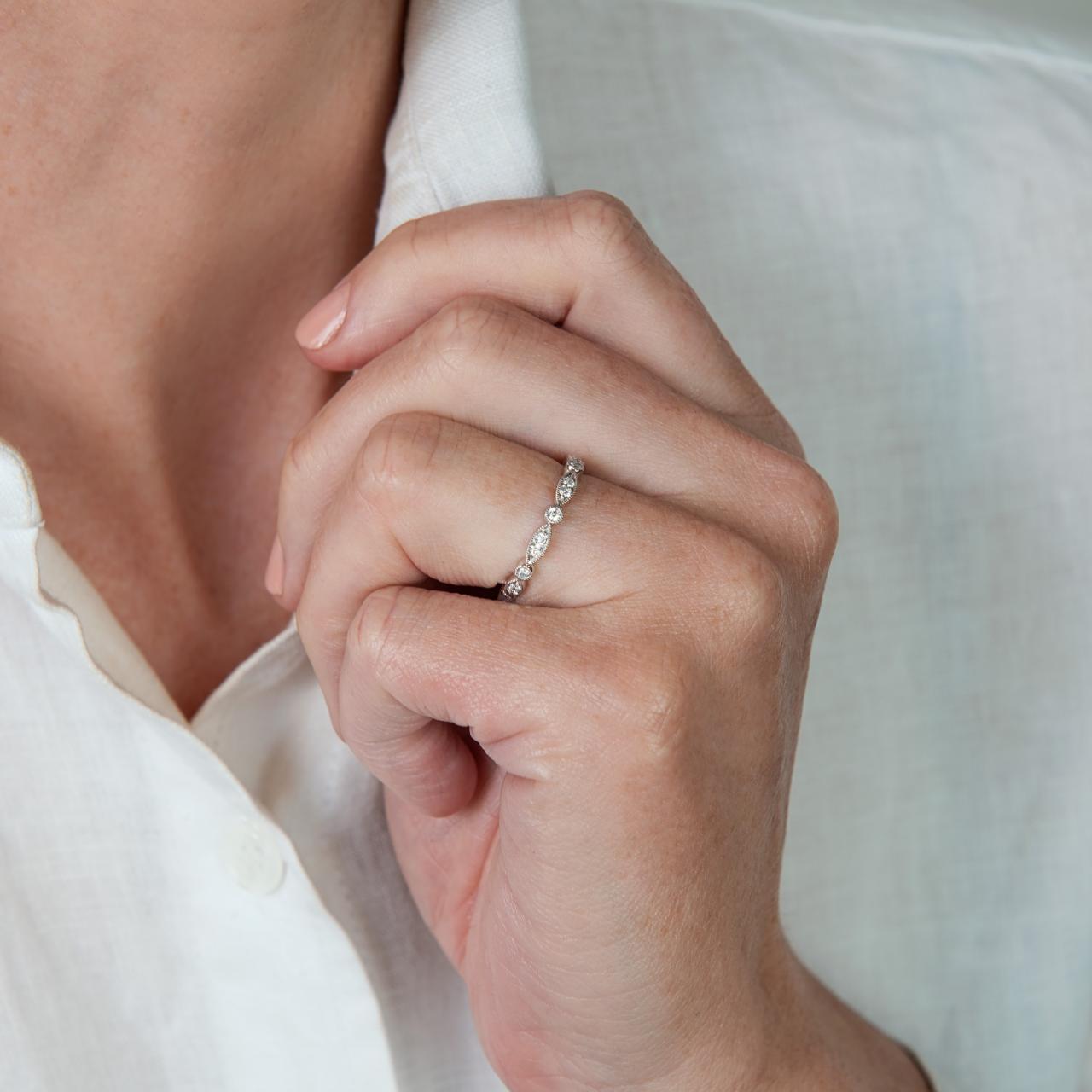 The LD diamond marquise & round continuum band, full circle of diamonds inwhite gold