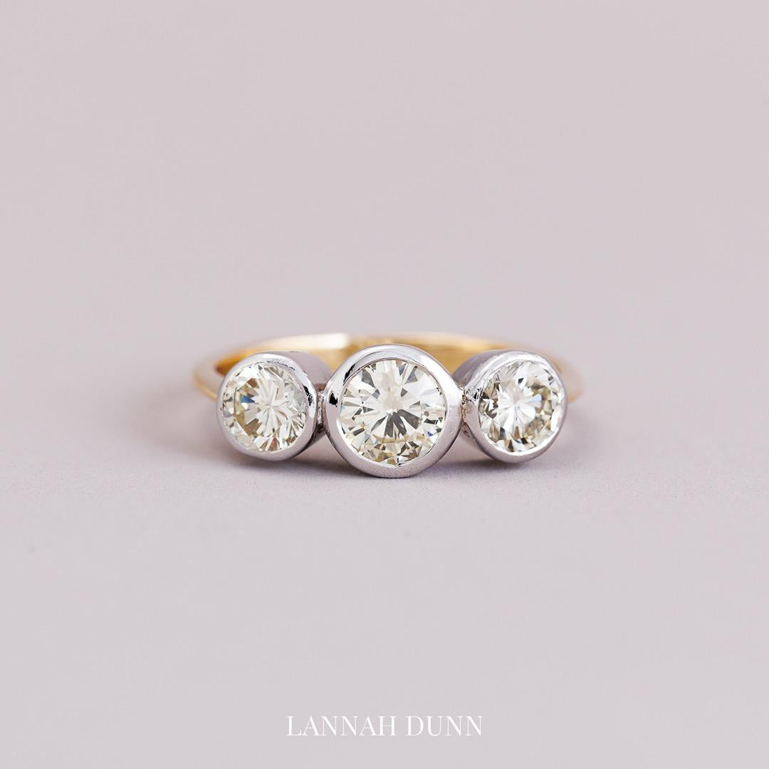 Antique three stone diamond ring