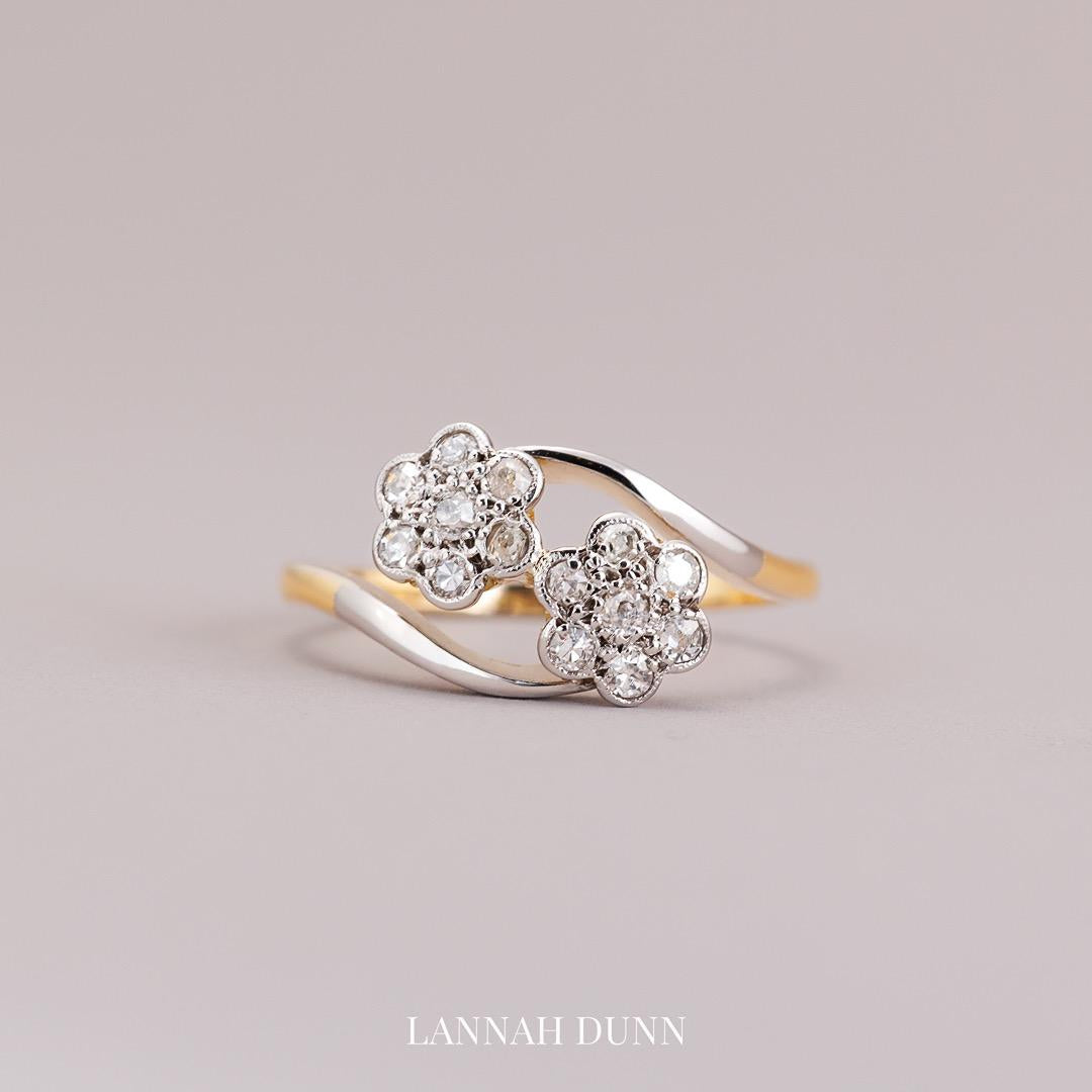 Vintage double daisy diamond twist ring