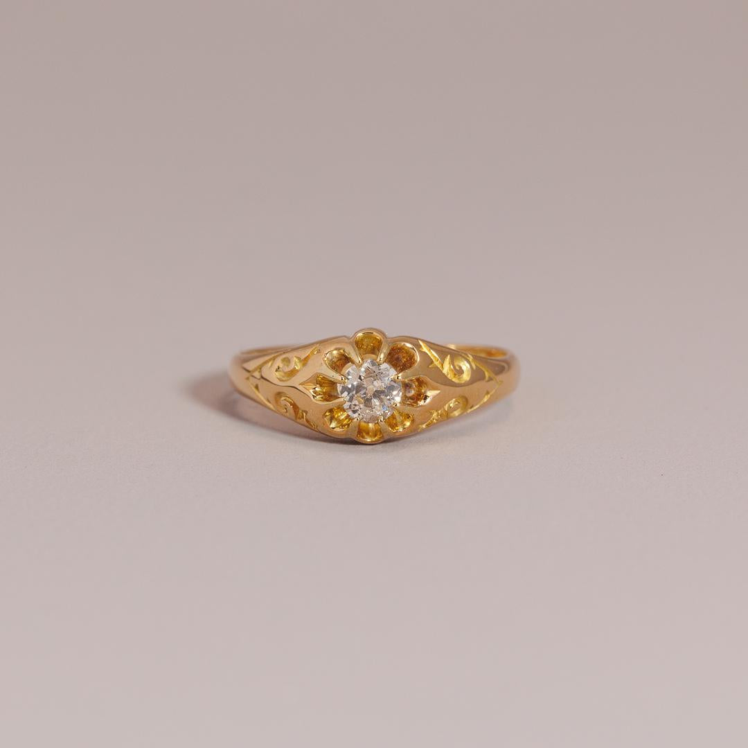 Antique carved  yellow gold single old cut diamond ring