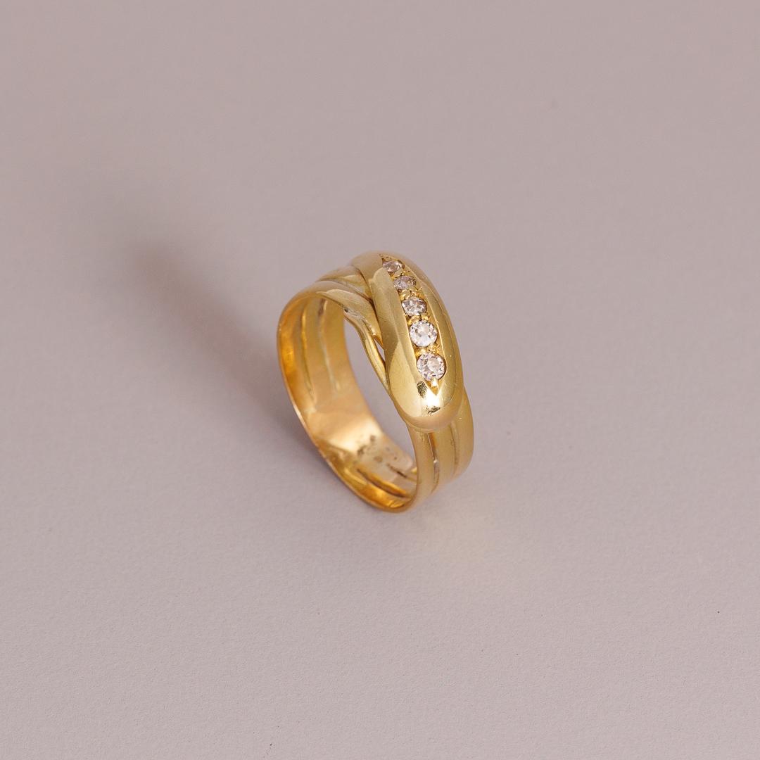 Diamond serpent eternity ring