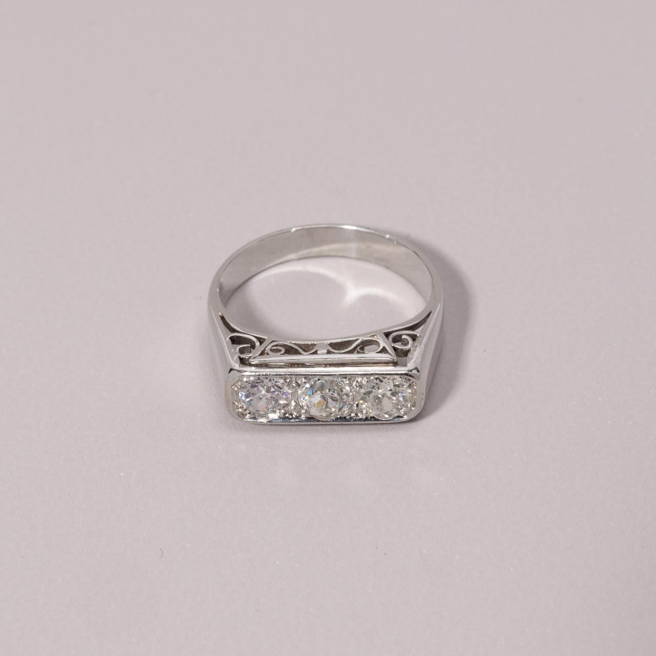 Art Deco platinum three-stone diamond ring