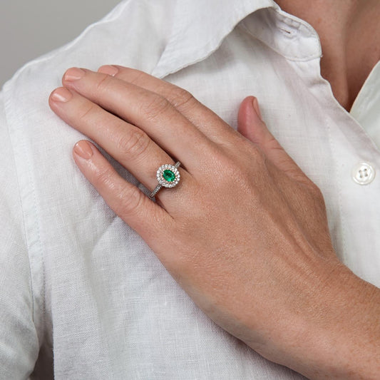 Pink Diamond & Emerald halo ring Pink Diamond & Emerald halo ring
