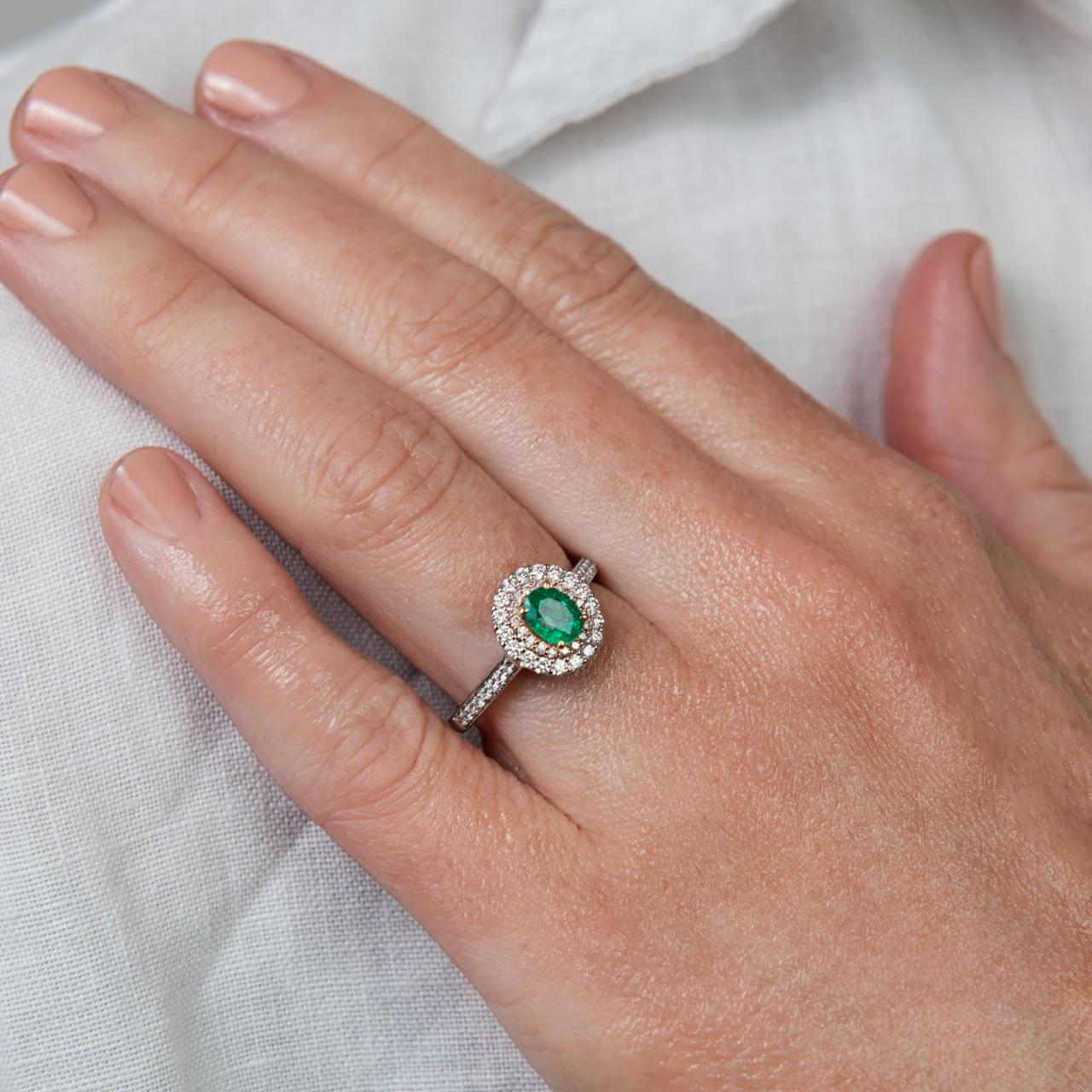 Pink Diamond & Emerald halo ring