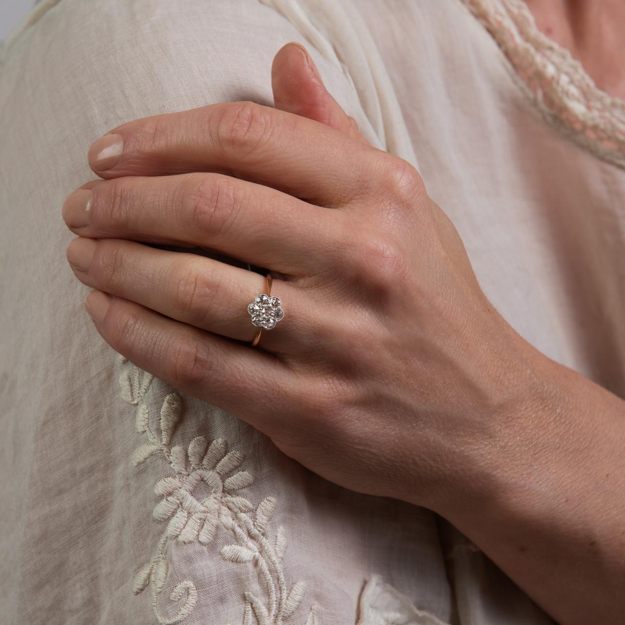 Old-cut diamond daisy cluster ring