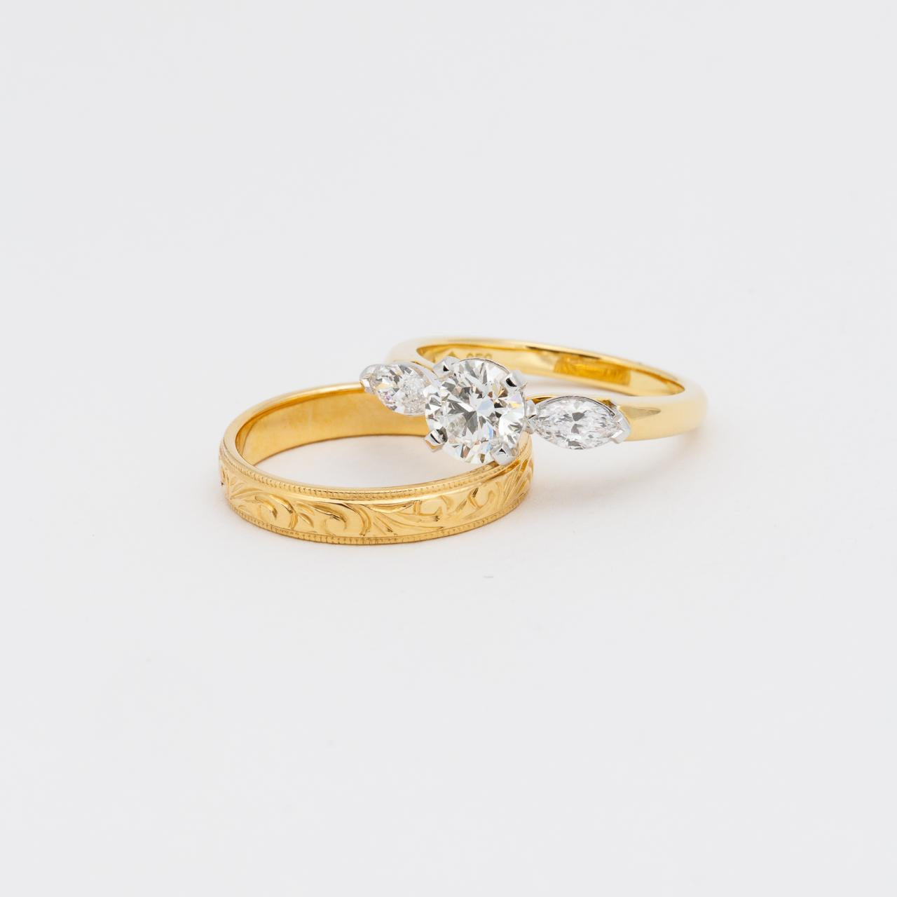 LD Design round brilliant cut & marquise three stone engagement ring in 18ct yellow gold and platinum