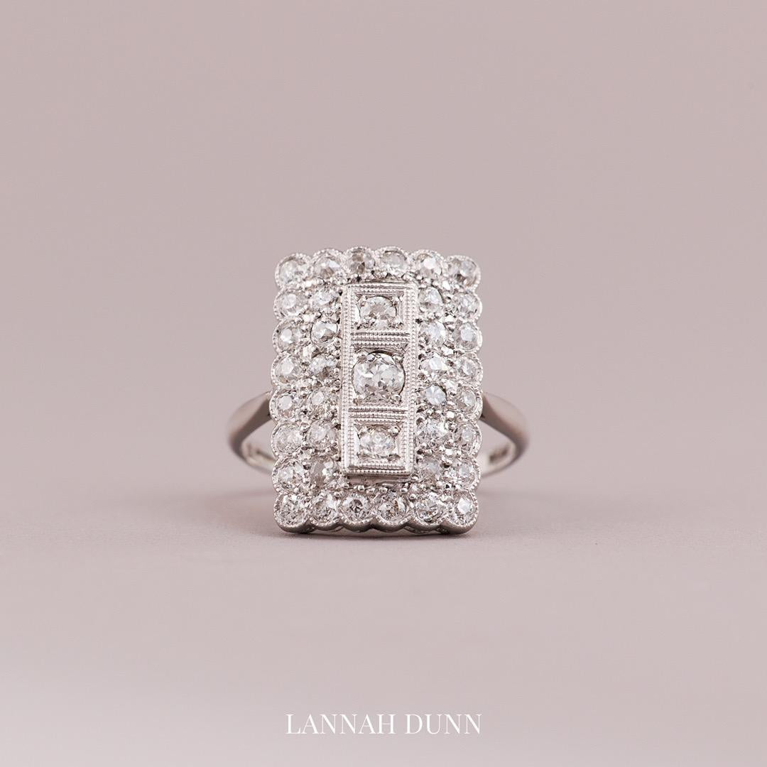 Platinum and natural diamond art deco dress ring