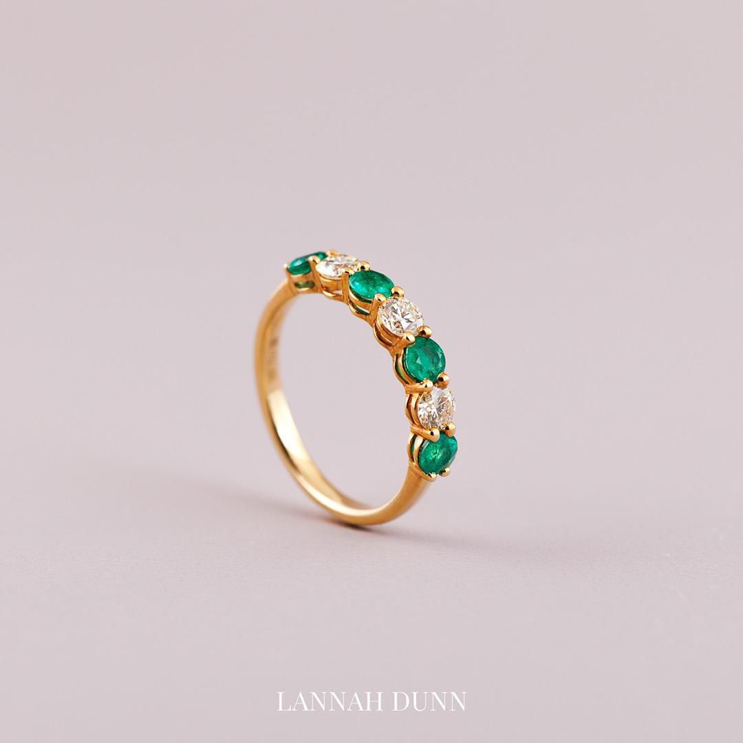 Natural emerald & diamond half eternity wedding ring