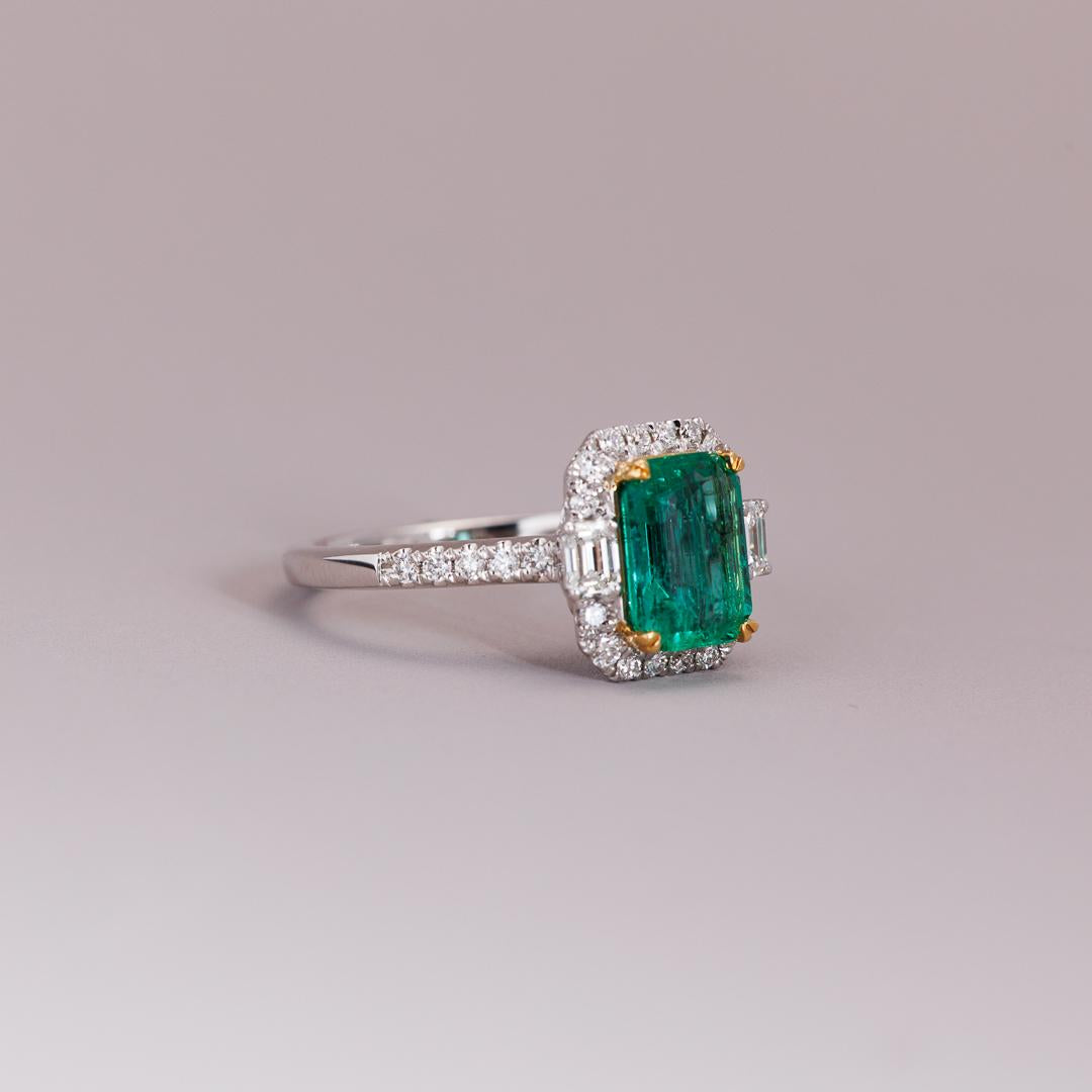 Emerald and diamond art deco style engagement ring
