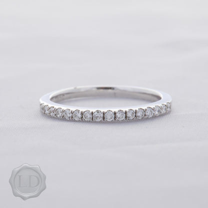 Lovely LD diamond wedding band in 18ct white gold size J