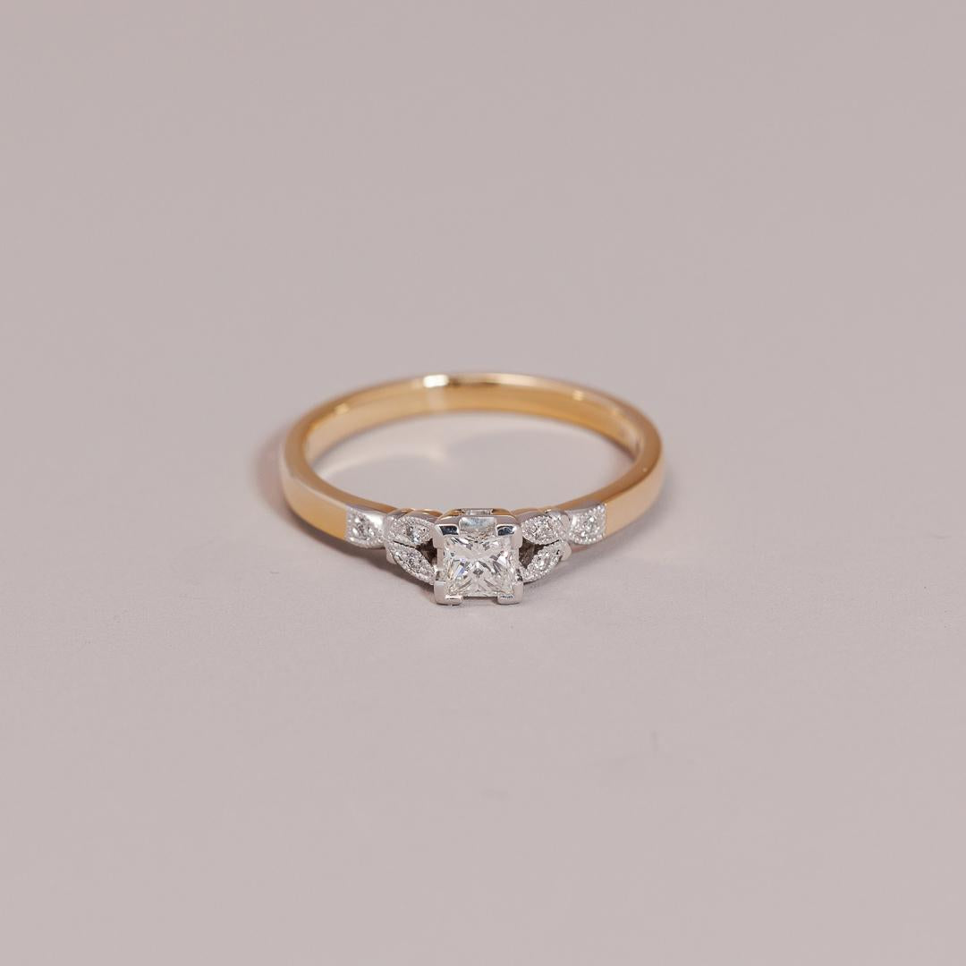 Yellow gold princess cut solitaire ring