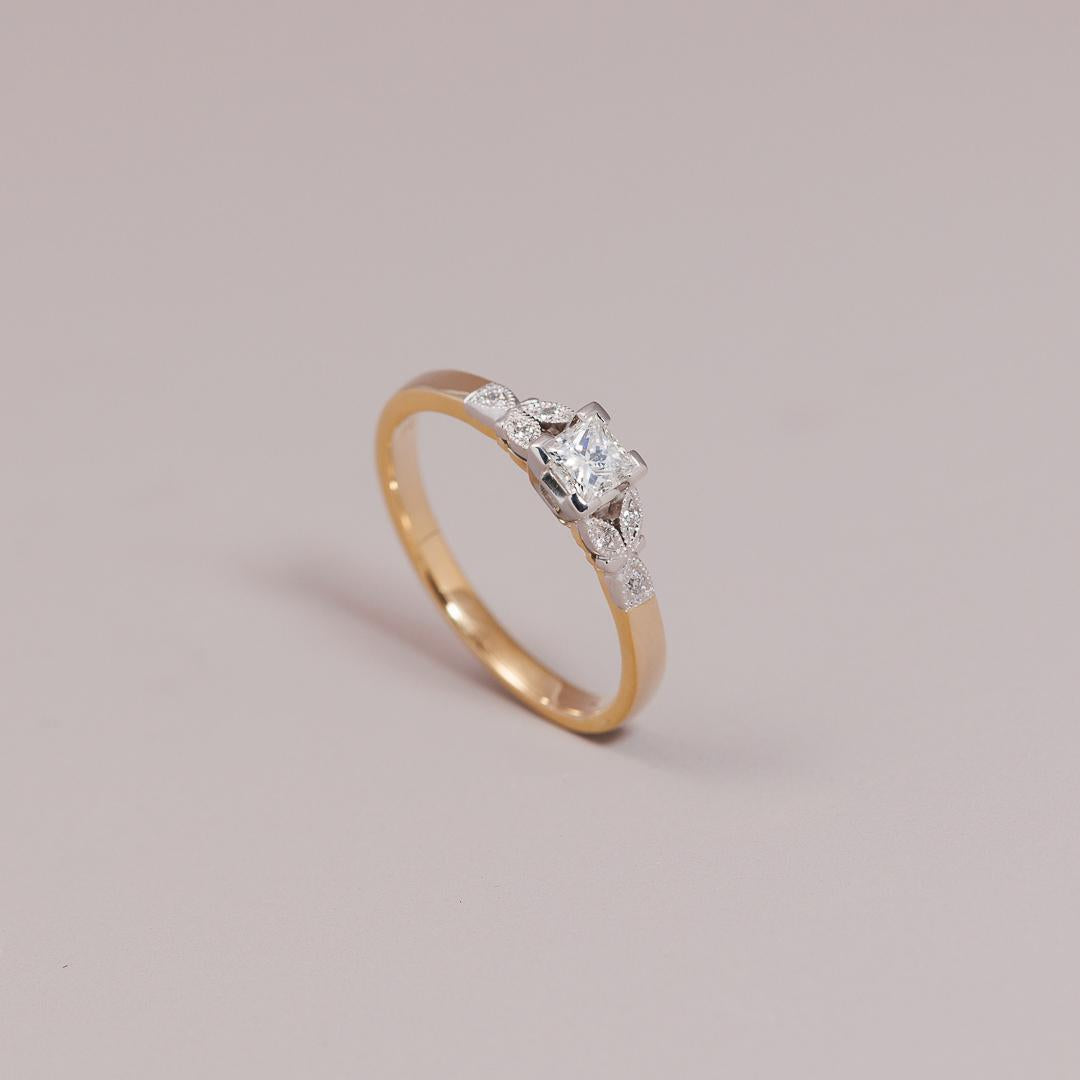 Yellow gold princess cut solitaire ring