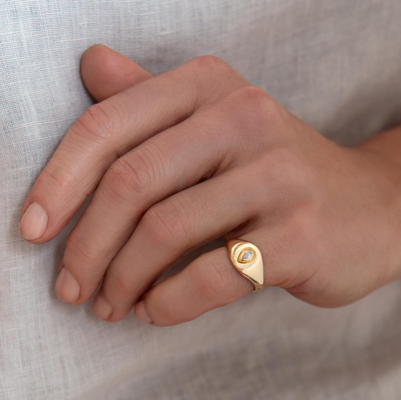 18ct monogram signet with pear-cut diamond