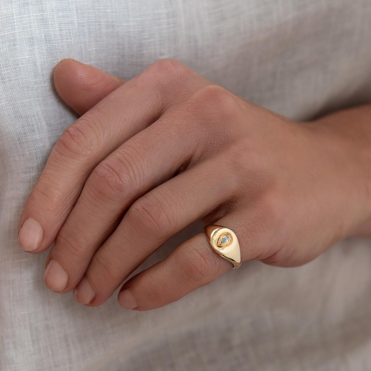 18ct monogram signet with pear-cut diamond