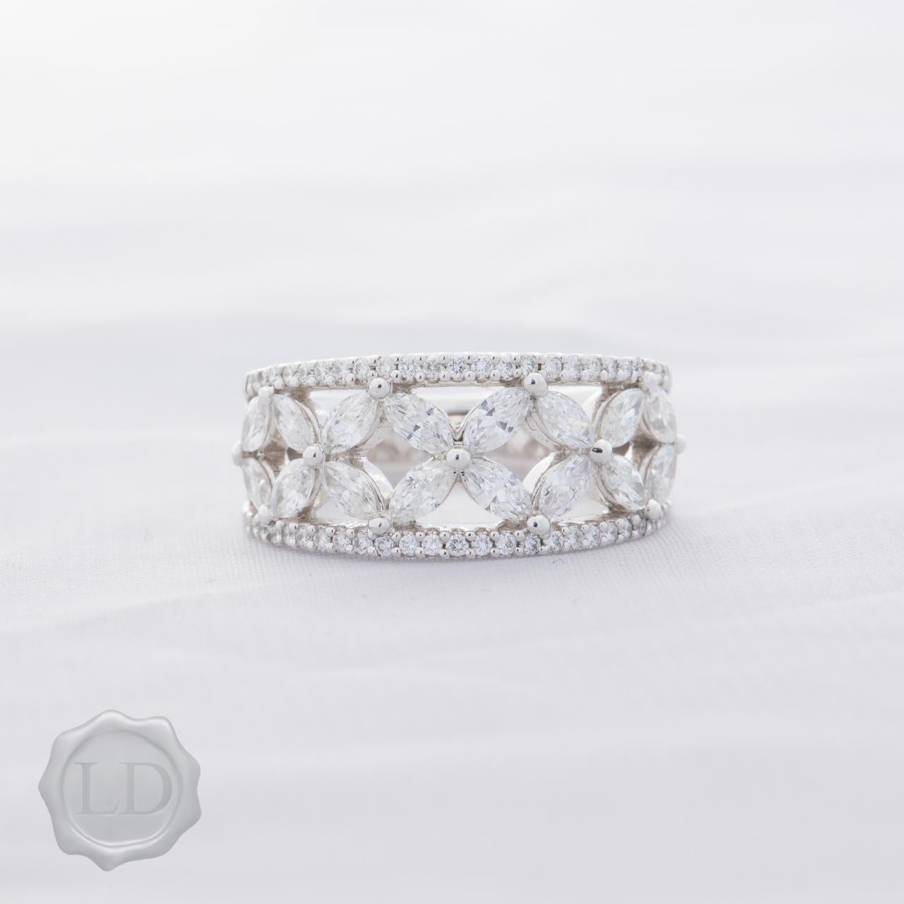 Fancy Marquise and brilliant cut diamond dress ring in platinum