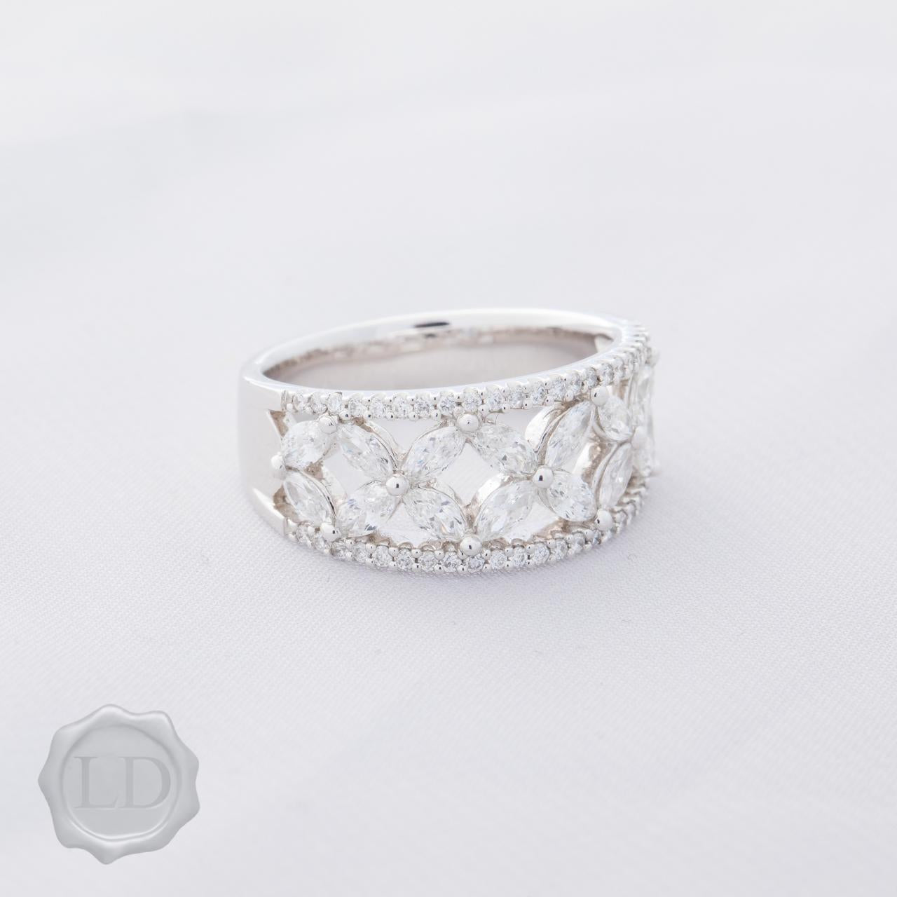Fancy Marquise and brilliant cut diamond dress ring in platinum