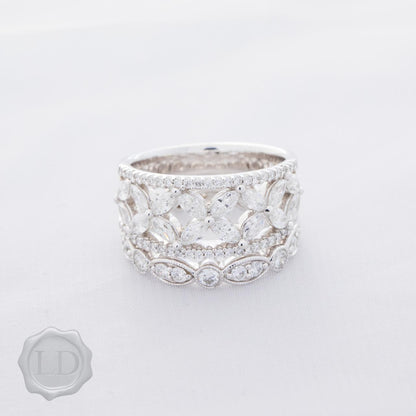 Fancy Marquise and brilliant cut diamond dress ring in platinum