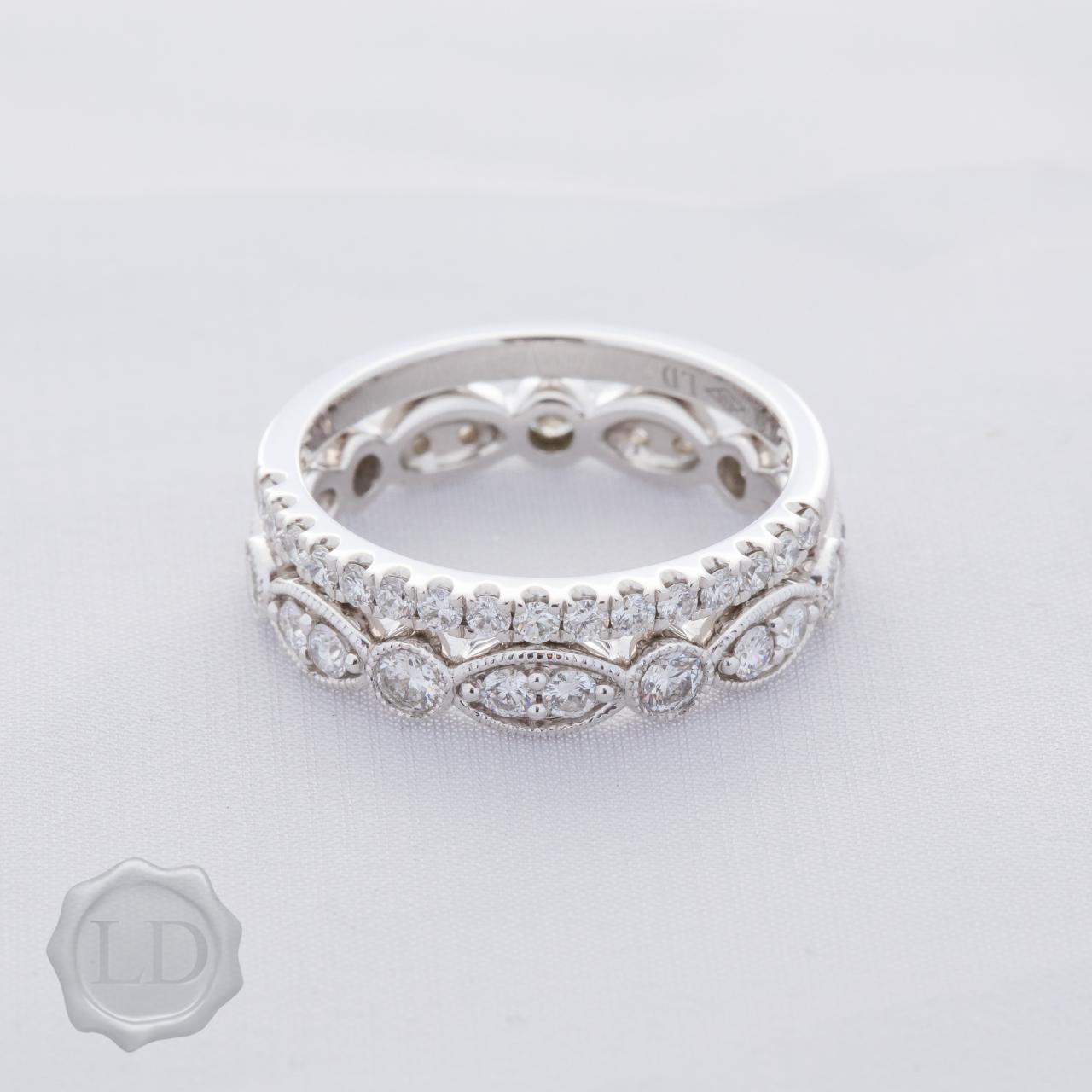 Lovely LD diamond wedding band in 18ct white gold, size M